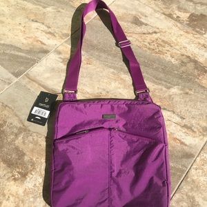 Purple Baggalini cross body purse.